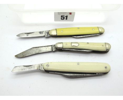 I.XL George Wostenholm, faux scales, two blades, n/s bolsters, brass linings, 7.5cm; Nowill and Sons, faux scales, three blad