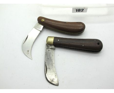 I.X.L. George Wostenholme Pruning Knife, with wood scales and brass bolster, 10.5cm; a Whitby stamped pruning knife with wood