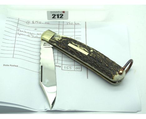 Stan Shaw Lock Knife, stag scales, single n/s bolster, lanyard ring, brass worked linings, work back to spring and blade, 13c