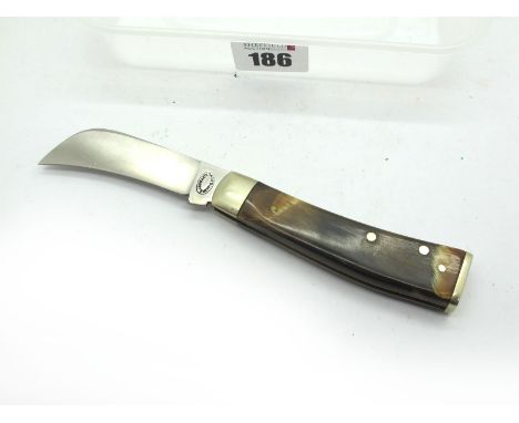 Howarth Sheffield, flat brass bottom, single blade pruner, polished horn scales, single brass bolster, 9.5cm.