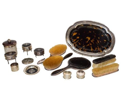 A tray of silver and tortoiseshell dressing table items, including three ring boxes, together with a silver tortoiseshell and