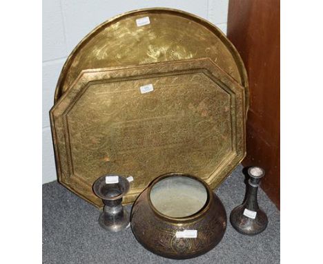 Two 19th century Indo-Persian brass serving trays, together with an Indian brass planter with mixed metal overlay, and two Is