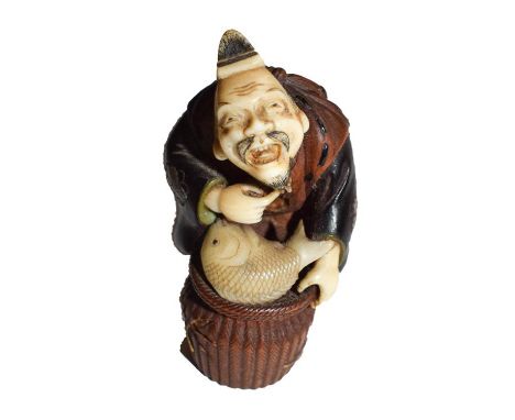 A Japanese Meiji period carved wood and ivory shibayama netsuke in the form of a fishmonger, signed 