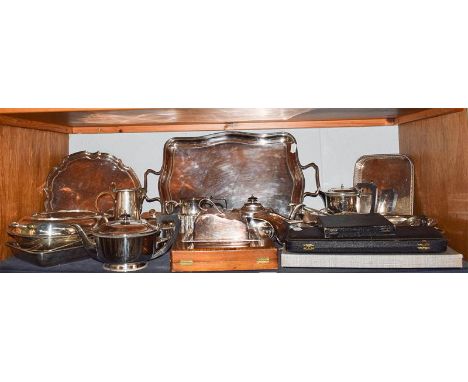 A quantity of silver plate including entree dishes, twin-handled tray, tea wares, meat skewers, trays etc (one shelf)