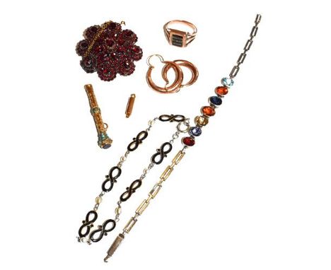 A garnet brooch, measures 4.1cm diameter, an enamel and hairwork memorial ring, a propelling pencil (a.f.) a pair of hoop ear