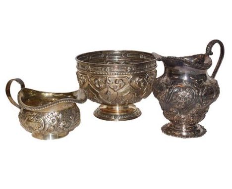An Edwardian silver pedestal sugar basin, Chester, 1901, a Victorian silver cream jug, London, 1893, and a George III silver 