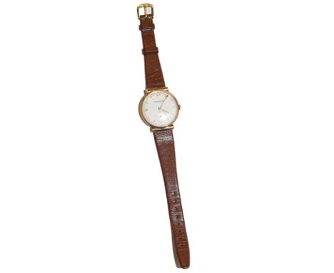 A 9 carat gold wristwatch, signed Jaeger LeCoultre, 1951, lever movement signed and numbered 688260, silvered dial with Arabi