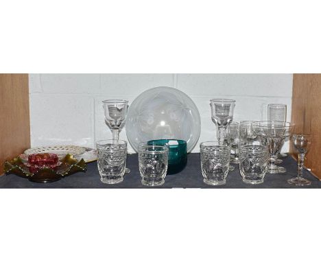 An opaque glass cherry bowl by G Vallou on stand, a collection of drinking glasses, emerald green finger bowls and two cerami