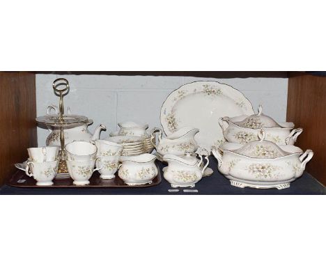 An extensive Royal Albert Haworth pattern tea and dinner service (one shelf)