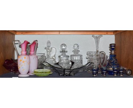 Assorted glassware including coloured Studio glass pieces, blue glass liqueur set, decanters, a four-flute epergne, and a pai