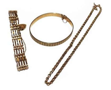 A gate link bracelet with a 9 carat gold heart shaped padlock clasp, a trace link chain, clasp stamped '9CT', length 35cm and