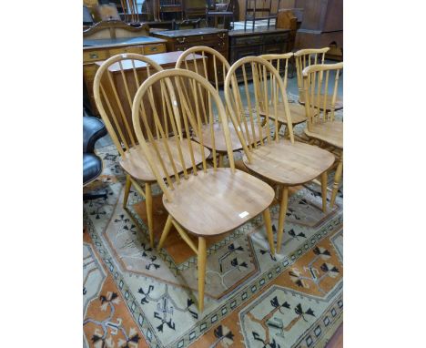 A set of four Ercol Blonde elm and beech Windsor chairs 