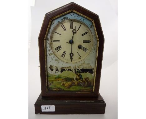 WOODEN MECHANICAL MANTLE CLOCK WITH PAINTED UPON GLASS FRONT, 30CM TALL WITH KEY AND PENDULUM