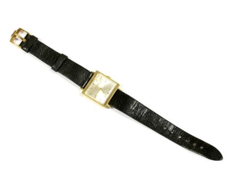 A mid-size 18ct gold Bulova mechanical strap watch, square case 27mm with silvered dial, gilt baton hour markers and pencil h