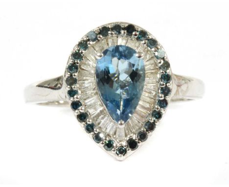 A white gold aquamarine and diamond cluster ring, a pear cut aquamarine claw set to the centre, with frame of baguette and ta