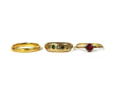 A 22ct gold wedding ring, London 1958, 2.89g, finger size M, together with a 9ct gold paste ring, Chester, 1.14g, and a gold 