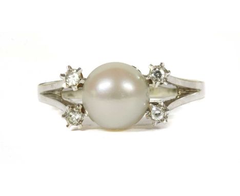 A French 18ct white gold cultured pearl and diamond ring, a cultured pearl, 7.9mm in size, cup set with a pair of eight cut d