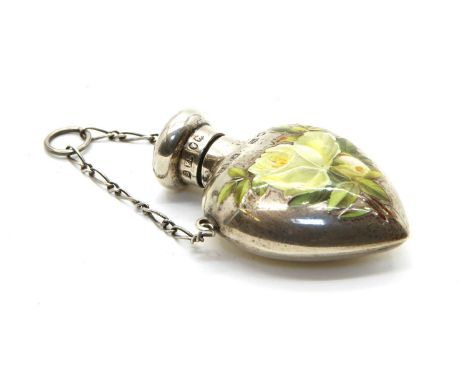 A Victorian silver and enamel perfume bottle, by Saunders &amp; Shepherd, of heart form, having central white rose hand paint