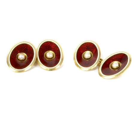 A pair of gold enamel and pearl cufflinks, each oval concave face with a split pearl rub set to centre of a red guilloché ena