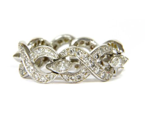 A gold diamond set chain link ring, a series of figure of eight links, all grain set with graduated eight cut diamonds with m