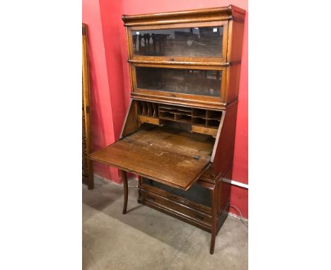 An early 20th Century Globe Wernicke oak sectional stacking bureau bookcase 