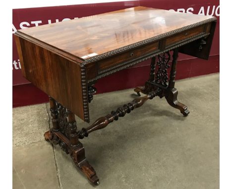 A Regency Goncalo Alves two drawer sofa table 