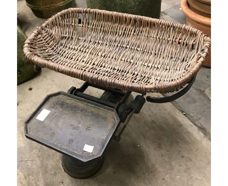 A set of vintage steel steel baby weighing scales 