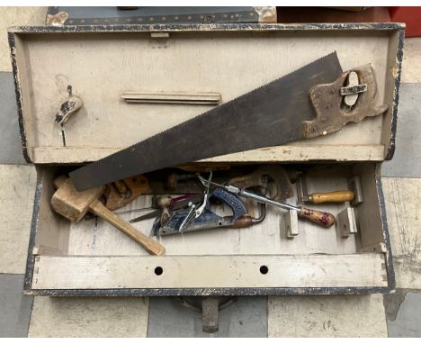 A stained pine carpenters tool chest with tools 