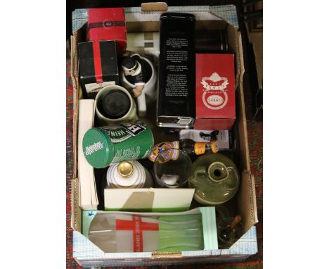 A box of collectables to include brewery and Whiskey related items.
