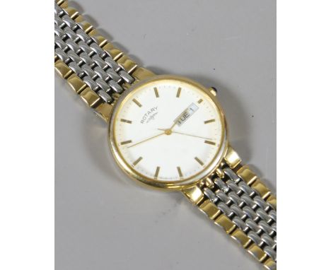 A gold plated Rotary bracelet watch with white and yellow metal strap with quartz movement, centre seconds and having date an