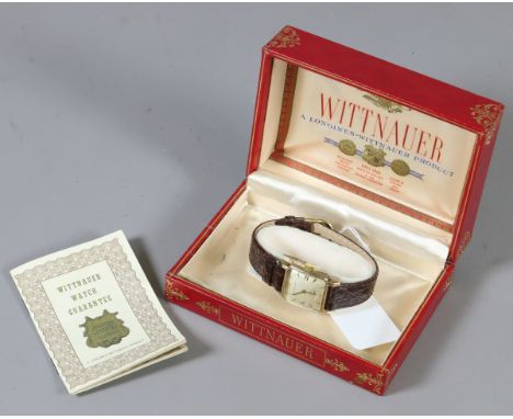 A 1950s Longines Wittnauer manual wristwatch in original box with square 10ct gold filled bezel, cushion shaped champagne dia