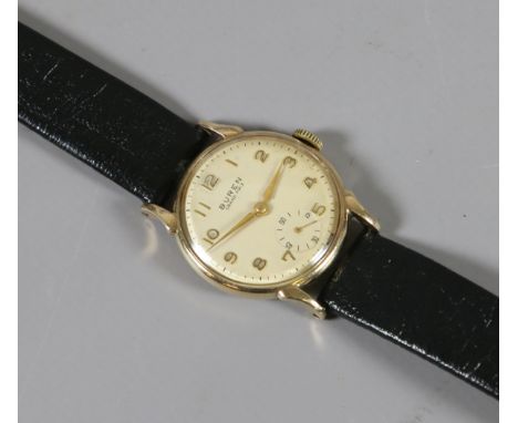 A vintage solid 9ct gold cased Buren Watch Co. Grand Prix manual wristwatch in Dennison case with shaped lugs. Having satin d