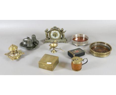 A collection of metalwares to include a pewter cruet set, brass mantel clock silver plated wine coaster, brass items etc.