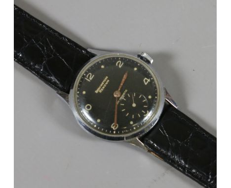 A vintage Bravvingtons Renown manual wristwatch with black dial and subsidiary seconds.