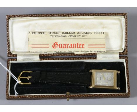 A vintage 9ct gold cased Art Deco style manual wristwatch in original fitted box with silvered dial having quartered textured