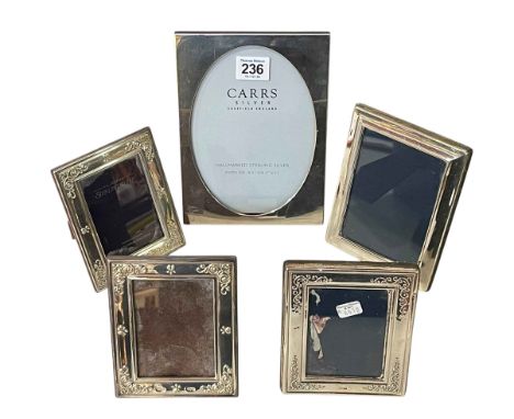 Five silver easel photograph frames including Carrs, 19.5cm by 14.5cm.