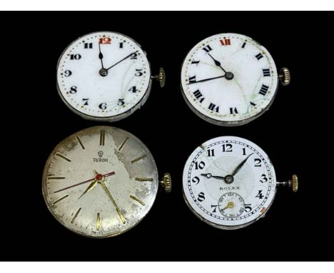 Three vintage Rolex watch movements and one Tudor (4).