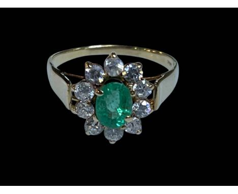 Emerald cluster 14 carat gold ring, size O.