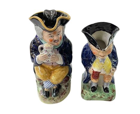 Two large 19th and 20th Century toby jugs and tapestry wall hanging.