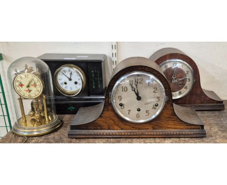 A 19th Century Belge Noir mantle clock, an anniversary clock and two oak mantle clocks 