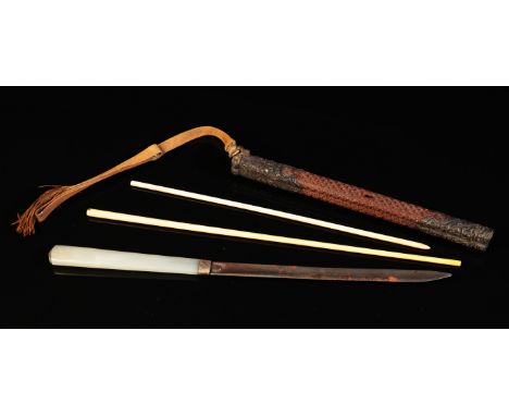 A CHINESE TROUSSE SET late Qing dynasty, comprising a jade handled knife and two bone chopsticks in a carved wood and metal m