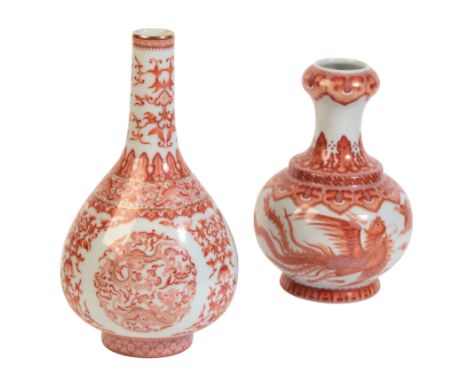 A CHINESE PORCELAIN BOTTLE VASEbearing a four character Qinalong seal mark to the base, 20th century, decorated in iron red w