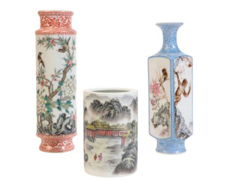 A CHINESE PORCELAIN BRUSH POTbearing an apocryphal four character mark to the base, 20th century, decorated with a mountainou