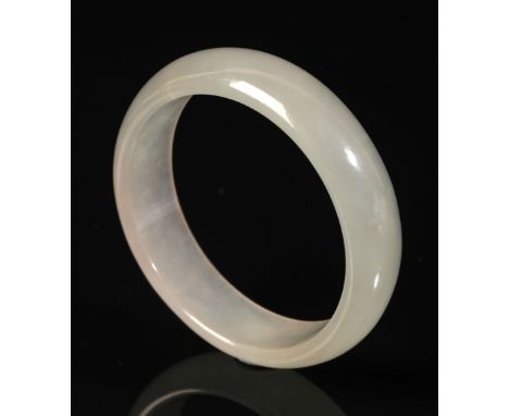 A CHINESE JADE RING BANGLE late Qing dynasty, 5cm diameterProvenance: The collection of Elisabeth Severance Prentiss (1865-19