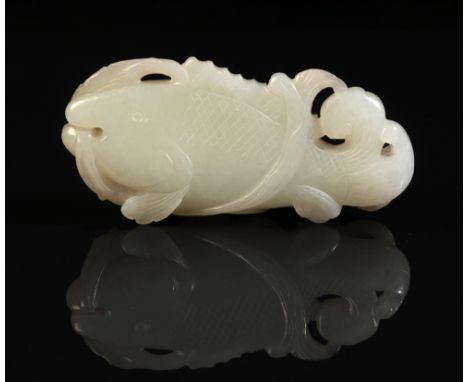 A CHINESE JADE FISH20th century, with incised details, 8.5cm long