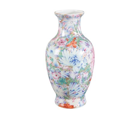 A CHINESE PORCELAIN 'HUNDRED FLOWERS' BALUSTER VASEbearing a six character Qianlong seal mark to the base, probably Republic 