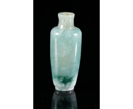 A CHINESE JADE SNUFF BOTTLE19th/20th century, of tapered cylindrical section, the pale jadeite with dark natural inclusions, 