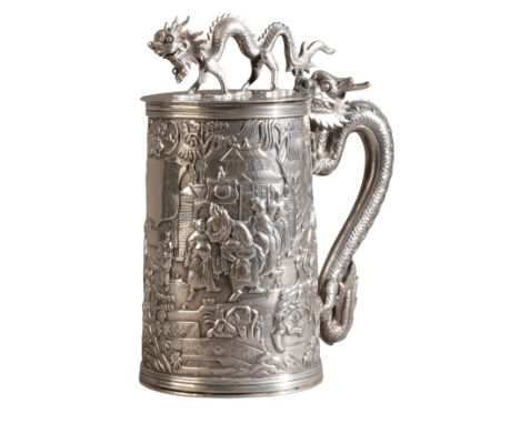 A CHINESE EXPORT SILVER TANKARD BY LEECHING marked to the base, the tapered cylindrical body with a vacant cartouche against 