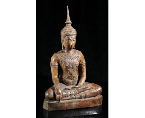 A THAI BRONZE FIGURE OF SEATED BUDDHA19th/20th century, cast seated with hands in bhumisparsha mudra, on a filled plinth base