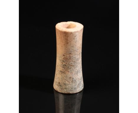 A CHINESE JADE TUBE possibly Shang dynasty or after, of tapered cylindrical form, 5.5cm high x 2.5cm diameter, in a fitted wo
